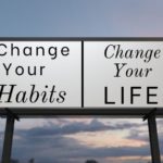 Image of Billboard saying " Change Your Habits, Change Your Life".